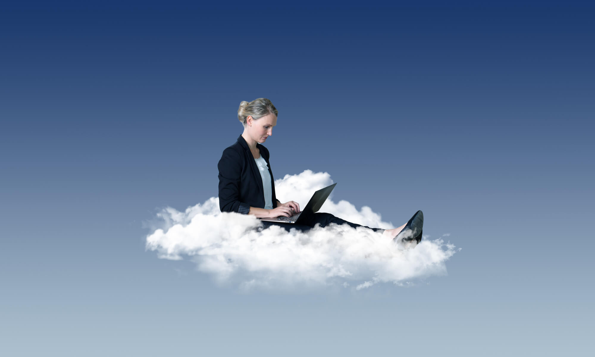 women seating on a cloud with a laptop on her lap